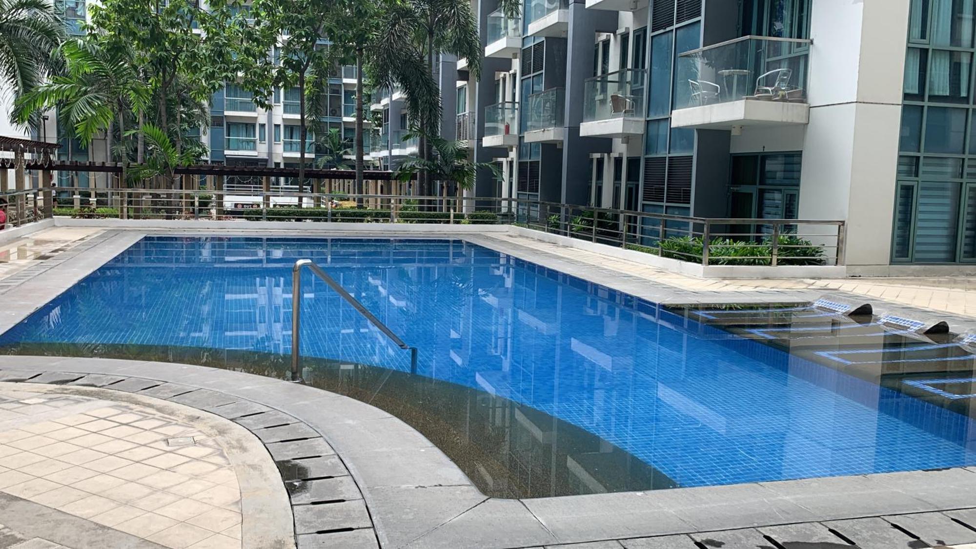One Palm Tree Villas Condominium - Studio 2Nd Fl With Balcony - Across Terminal 3 Airport 帕赛 外观 照片